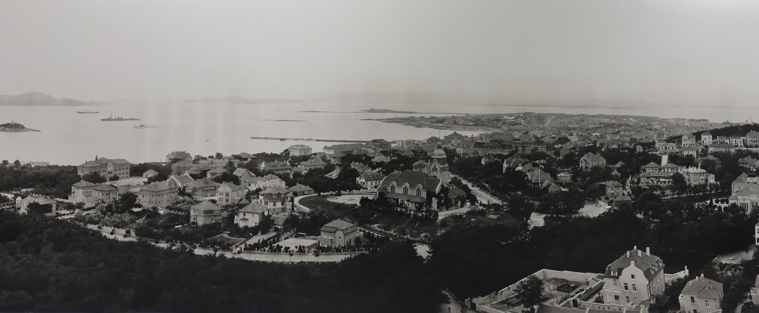 An early 20th century Chinese panoramic photograph of Qingdao Paper 149 x 25cm